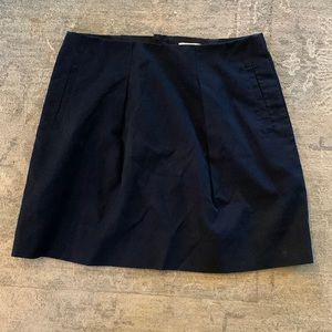 J crew navy skirt with pockets and back zipper.